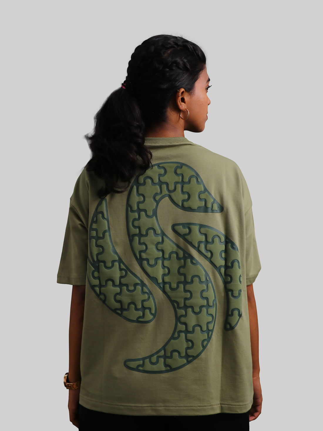 Abstract puzzle print t-shirt olive green unisex graphic tee modern streetwear casual fashion