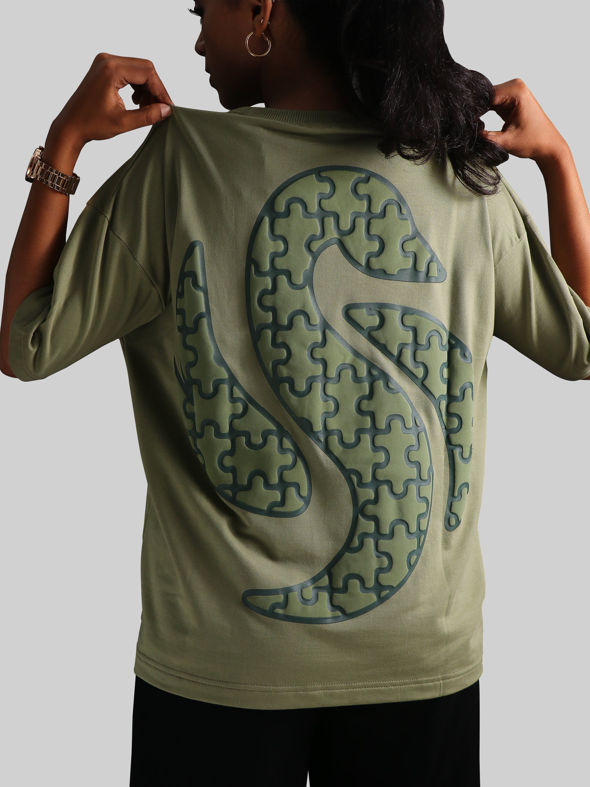 Casual olive green abstract t-shirt puzzle graphic print unisex fashion tee