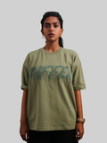 Abstract puzzle print t-shirt olive green unisex graphic tee modern streetwear casual fashion
