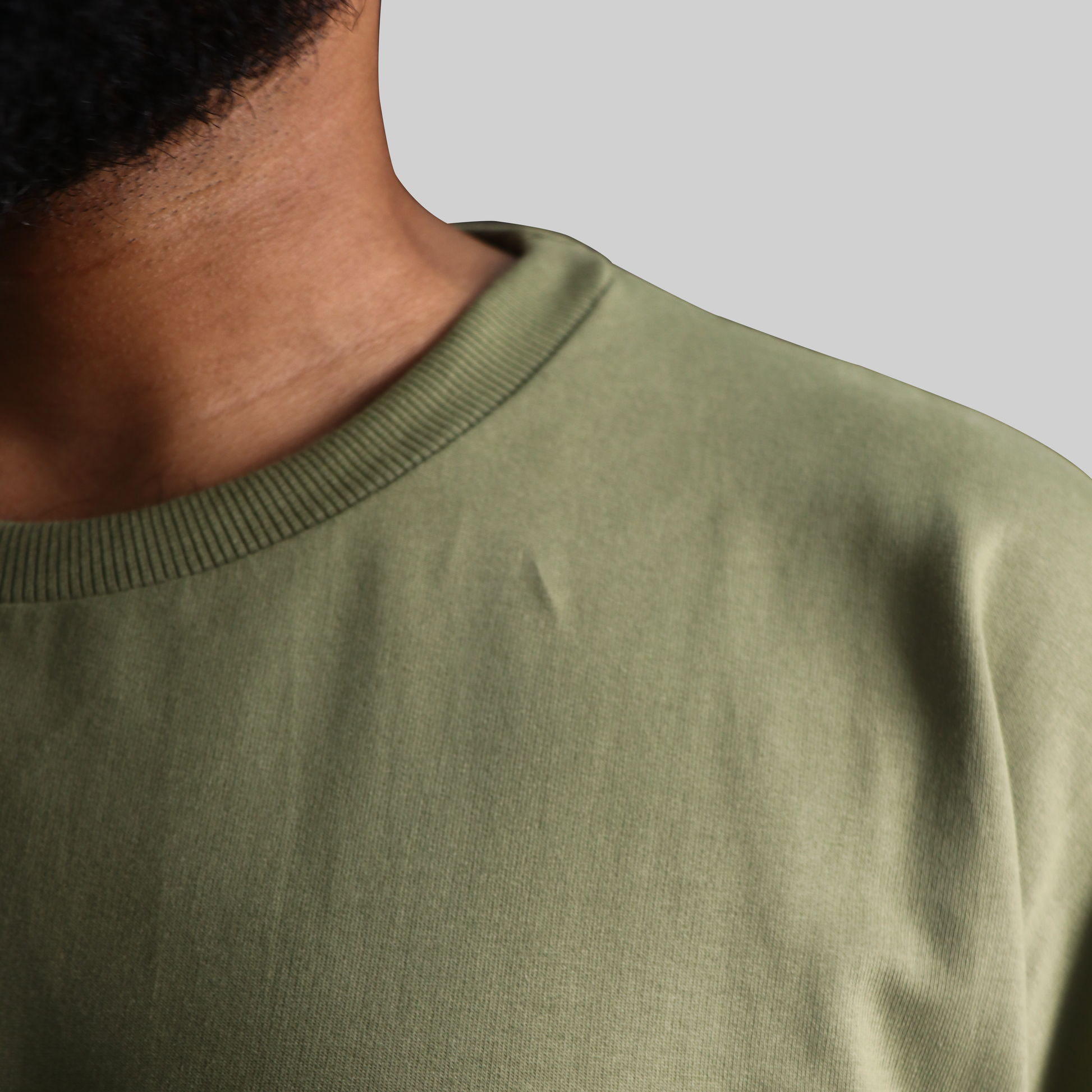 Unisex olive green graphic tee abstract puzzle print modern streetwear style