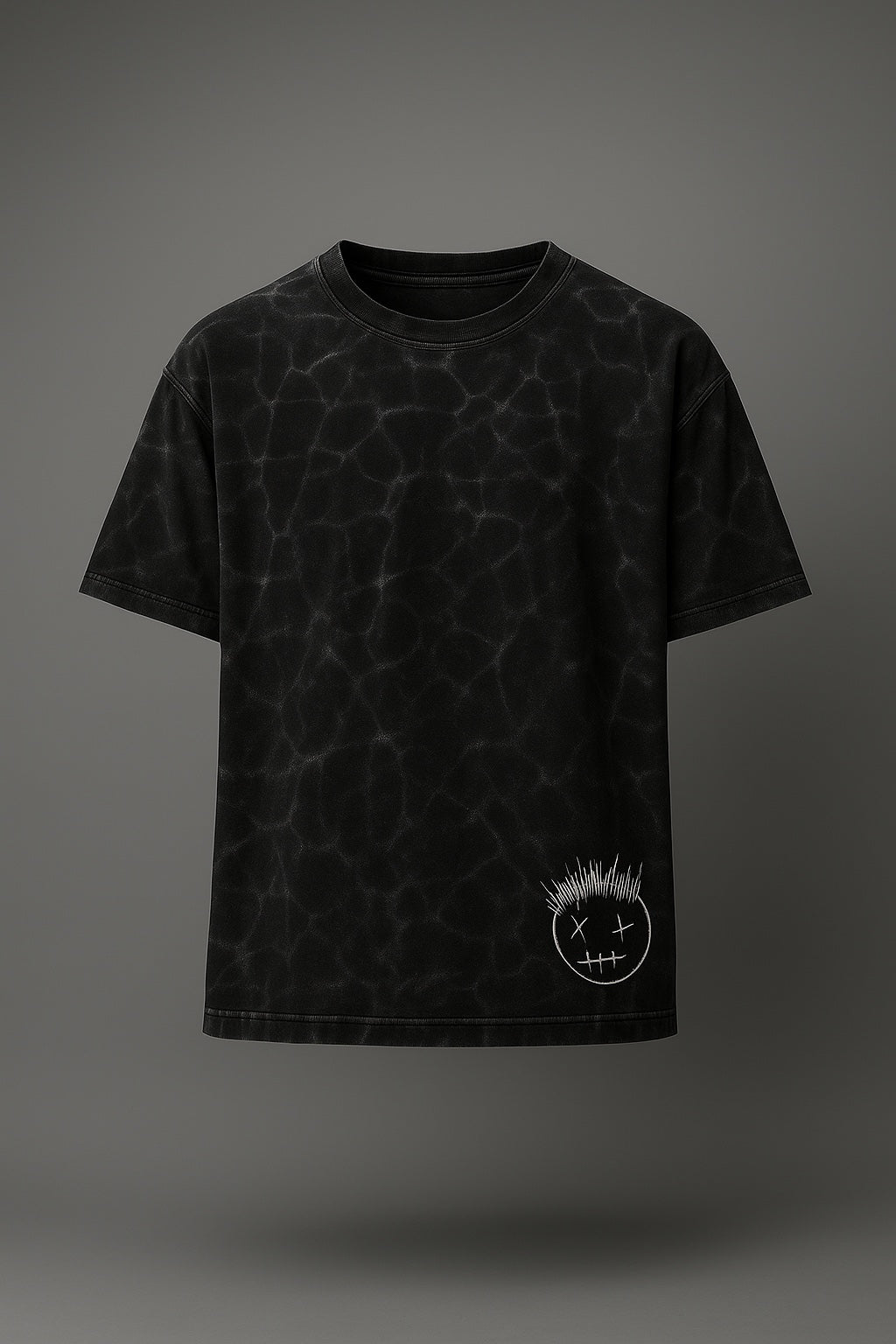 Black tie-dye t-shirt with a white logo on a gray background