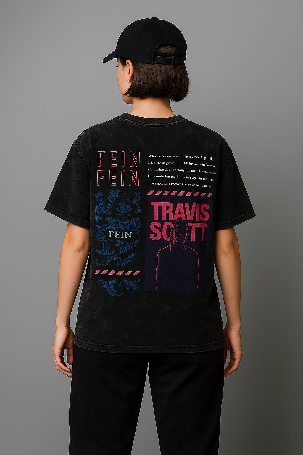 Person wearing a black t-shirt with 'Travis Scott' branding on a gray background