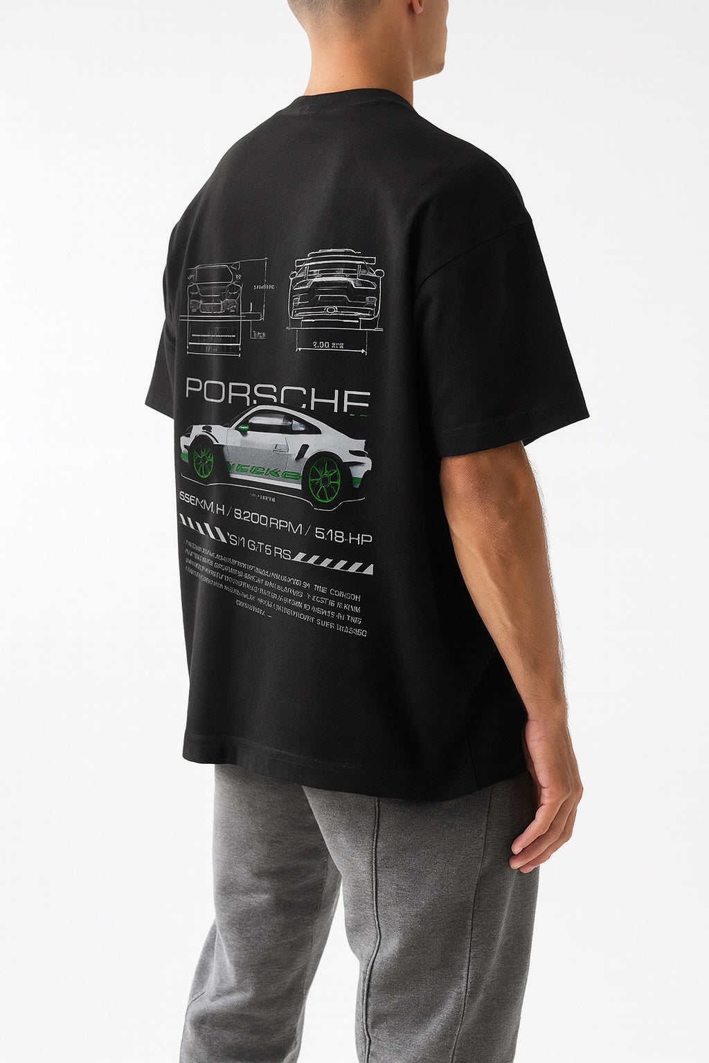 Person wearing a black t-shirt with Porsche car design on the back