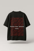 Black t-shirt with red paisley pattern and white text on a light gray background