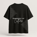 Black t-shirt with white geometric patterns and text on a light gray background