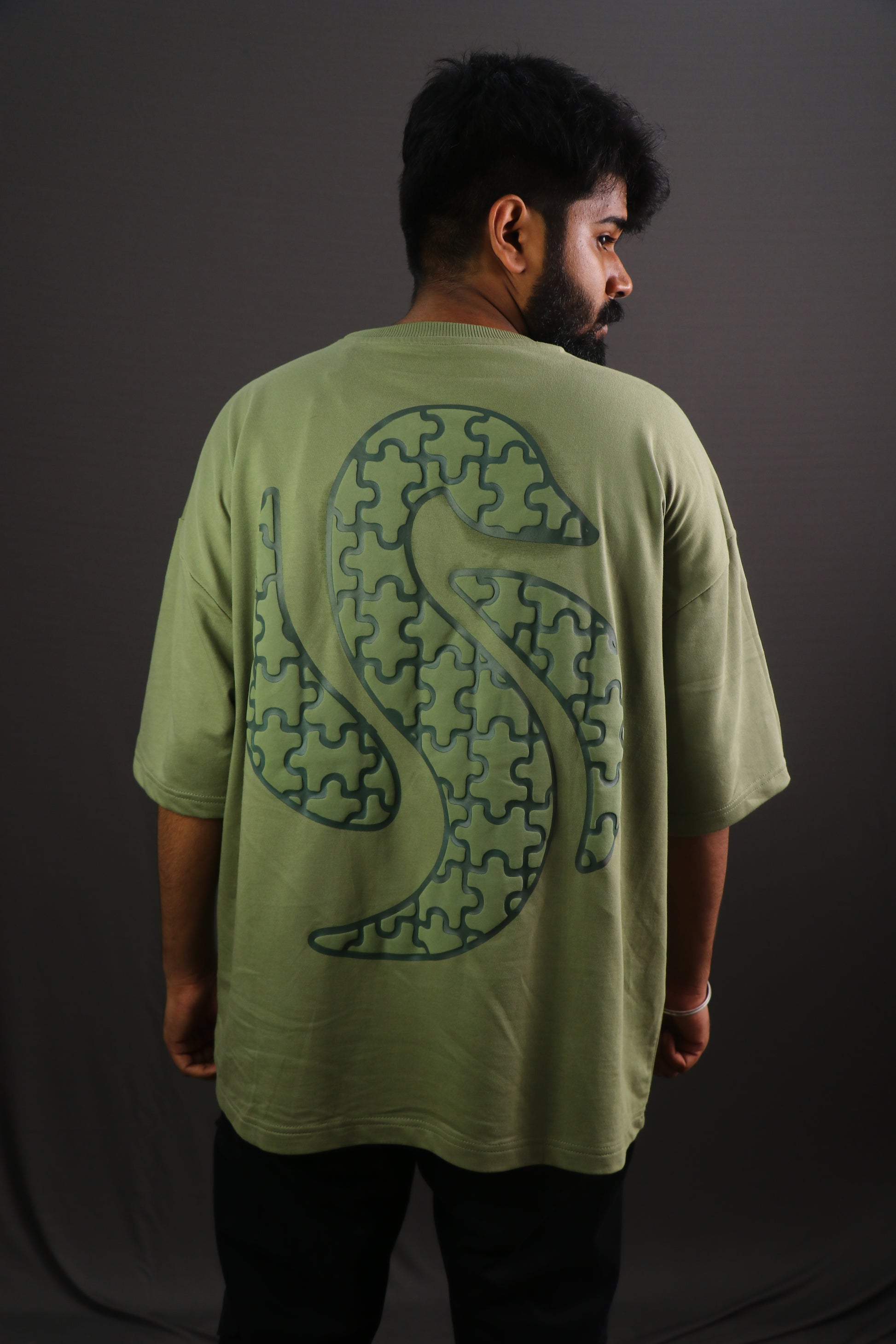 Casual olive green abstract t-shirt puzzle graphic print unisex fashion tee